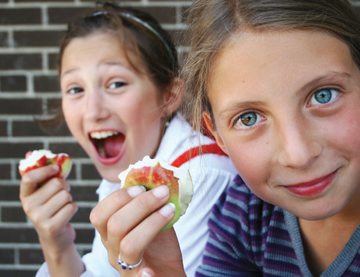 Students enjoying food on school camp