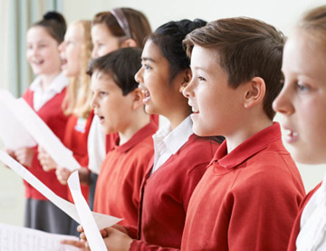 School Students enjoying singing christmas carols 